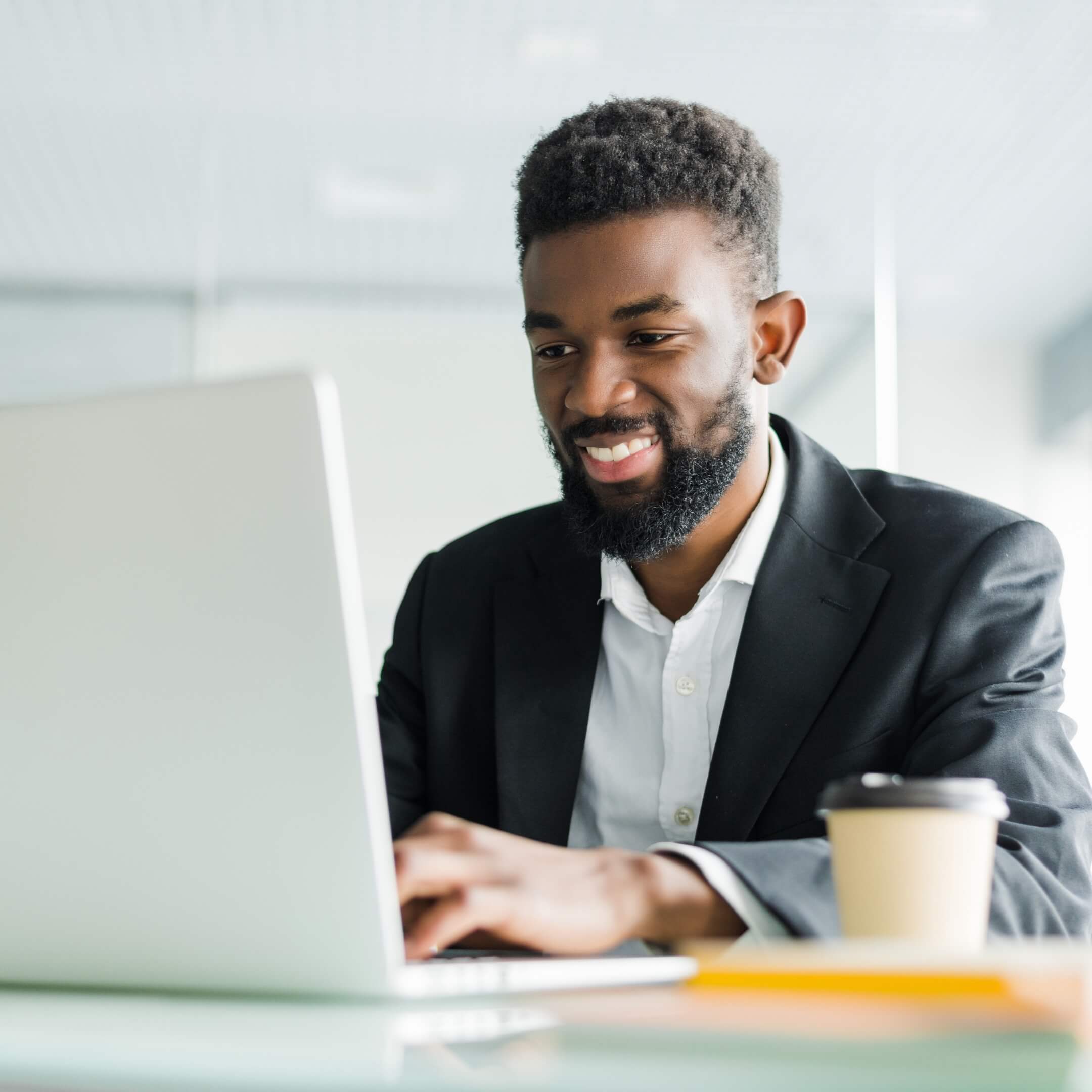 Man using Optic Data AI-Powered insights on laptop